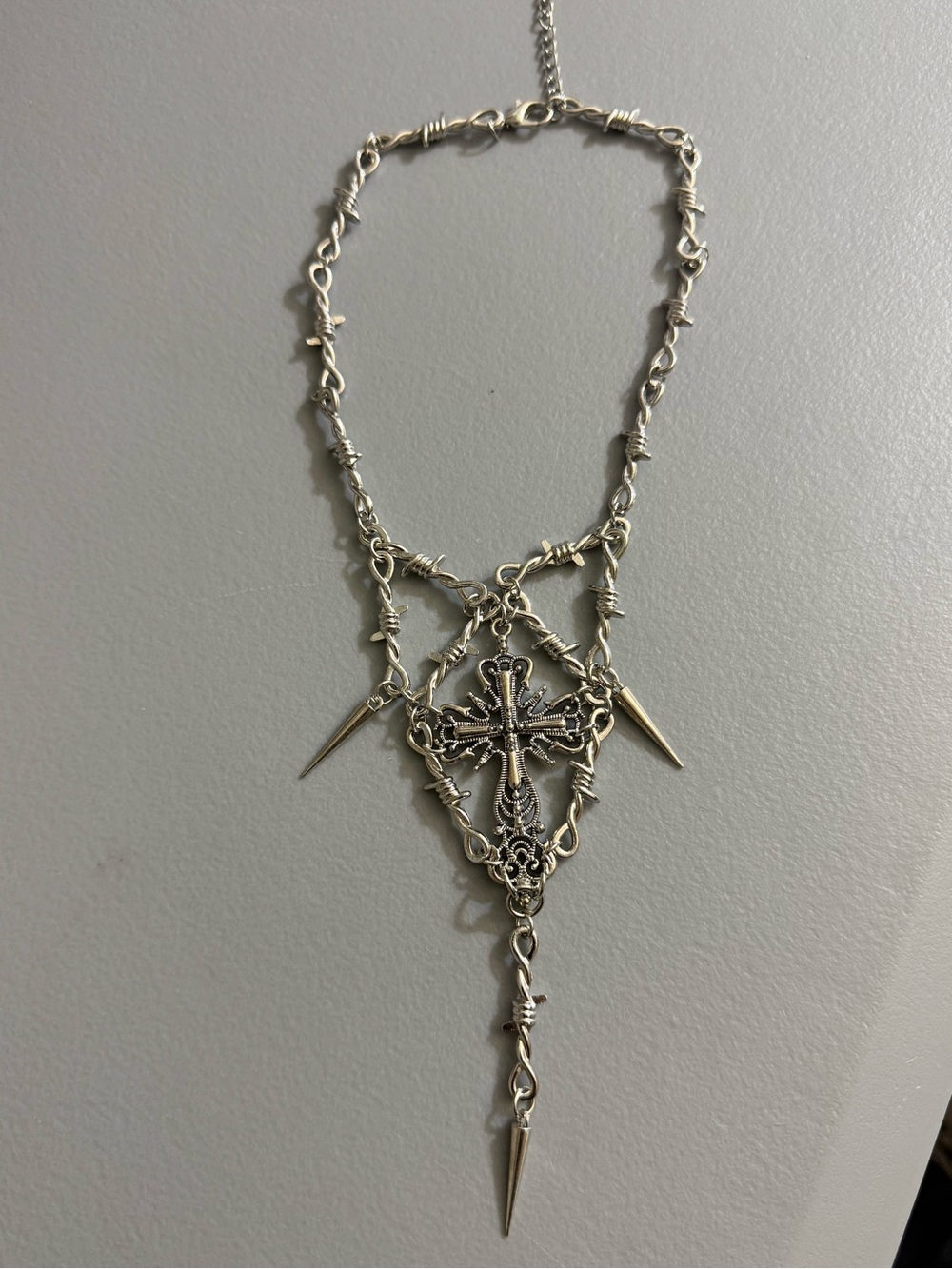 gothic barbed wire necklace features a central ornate cross pendant and spike - Picture 4 of 7